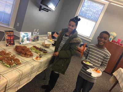 Two Kids Dishing Up