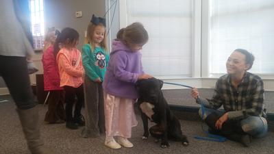 Children Petting Dog